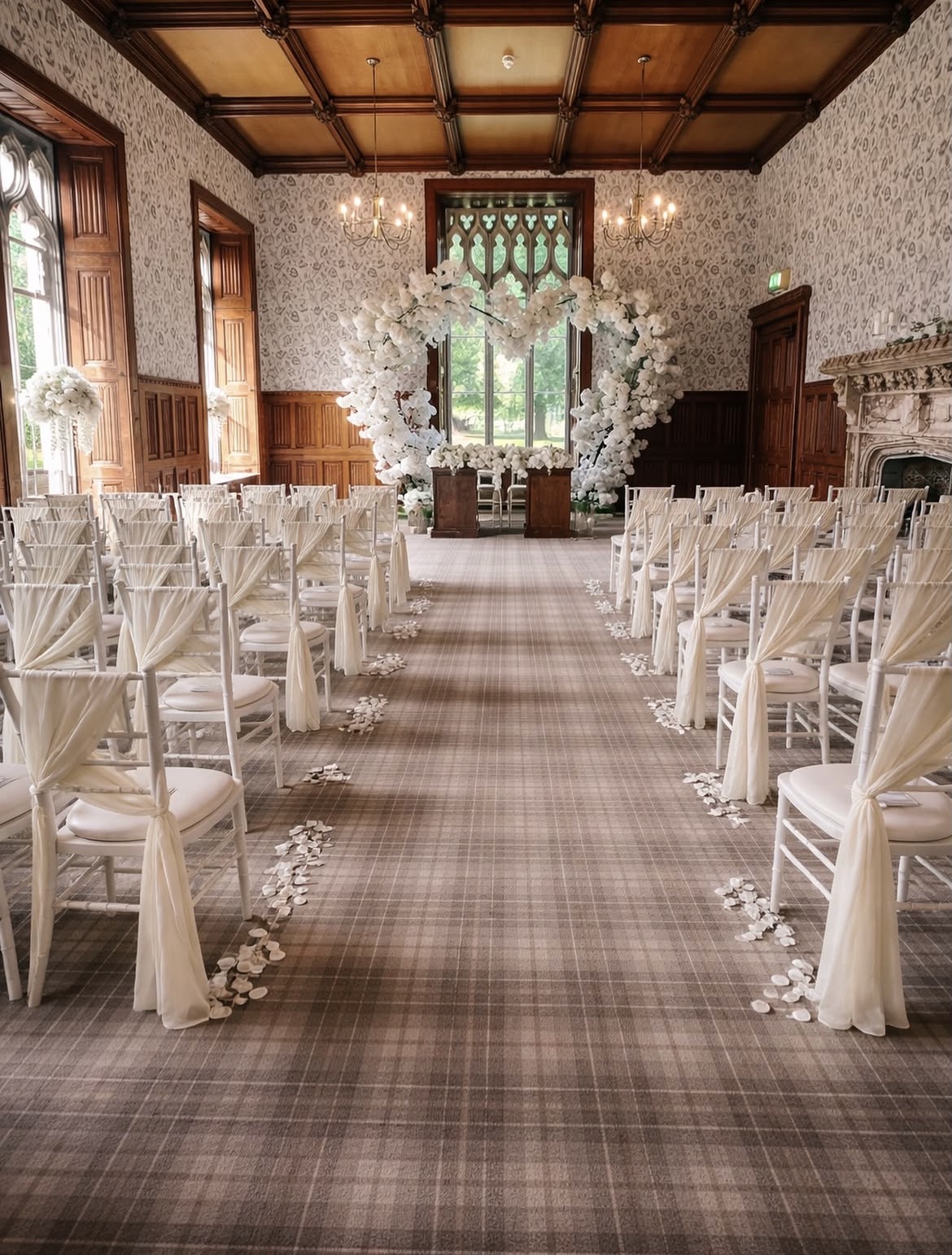 Great hall ceremony with white orchid arch